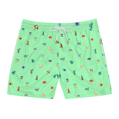 Green swim shorts with colorful patterns on a white background