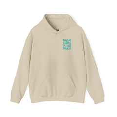 Beige hoodie with a teal beach graphic on a white background