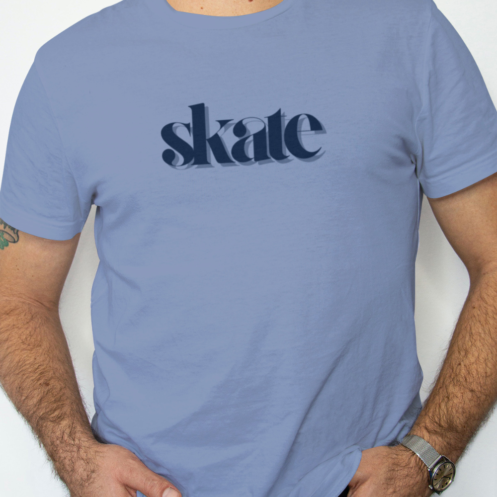 Person wearing a blue t-shirt with 'skate' printed on it against a white background