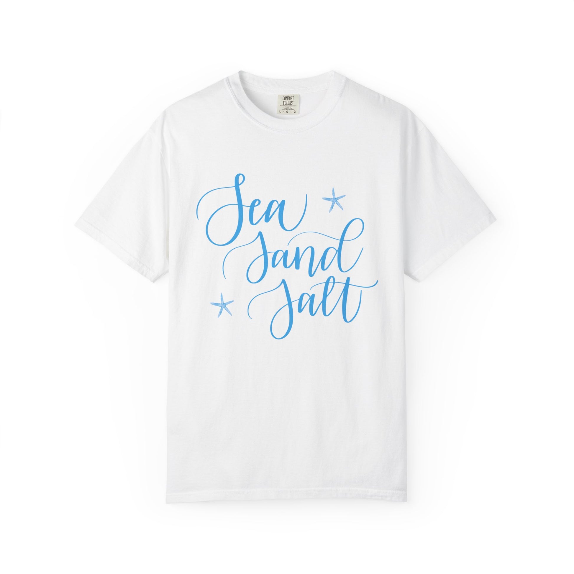 White t-shirt with 'Sea Sand Salt' text in blue on a white background