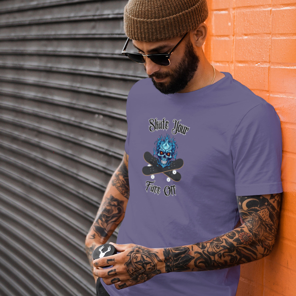 Man wearing a purple t-shirt with a graphic design against an orange wall.