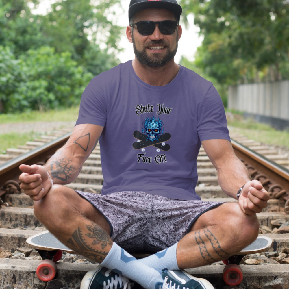 Man sitting on a skateboard wearing a purple t-shirt with a graphic design.