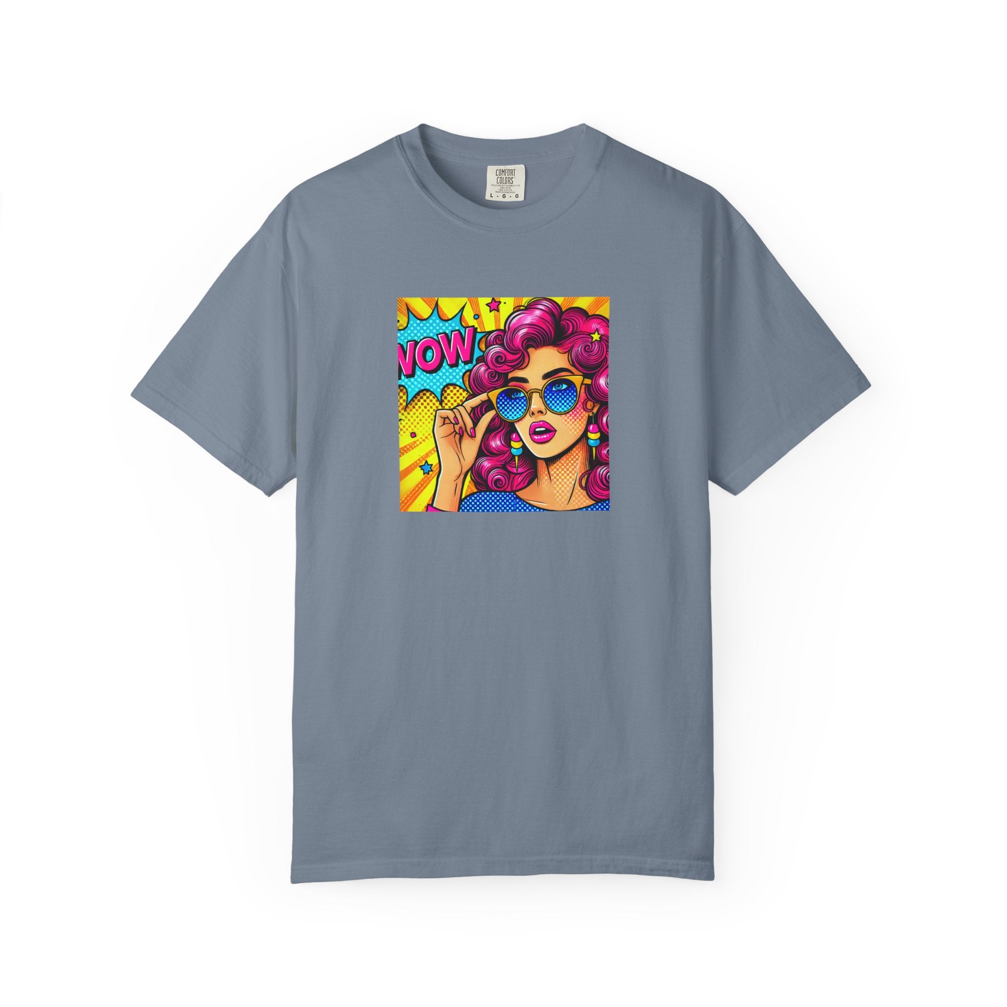 Gray t-shirt with a colorful graphic of a woman with pink hair and sunglasses on a white background