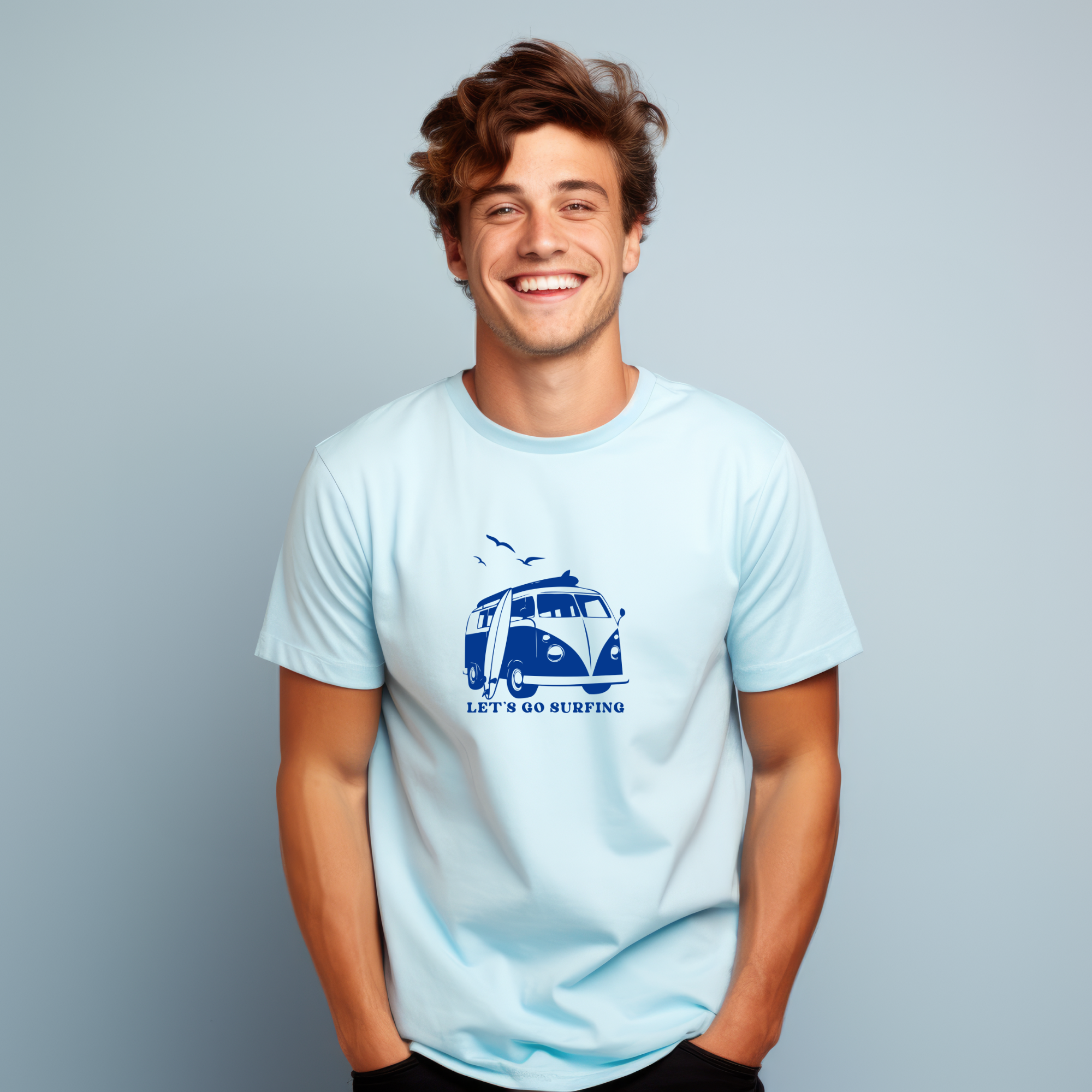 Person wearing a light blue t-shirt with a graphic design on a gray background
