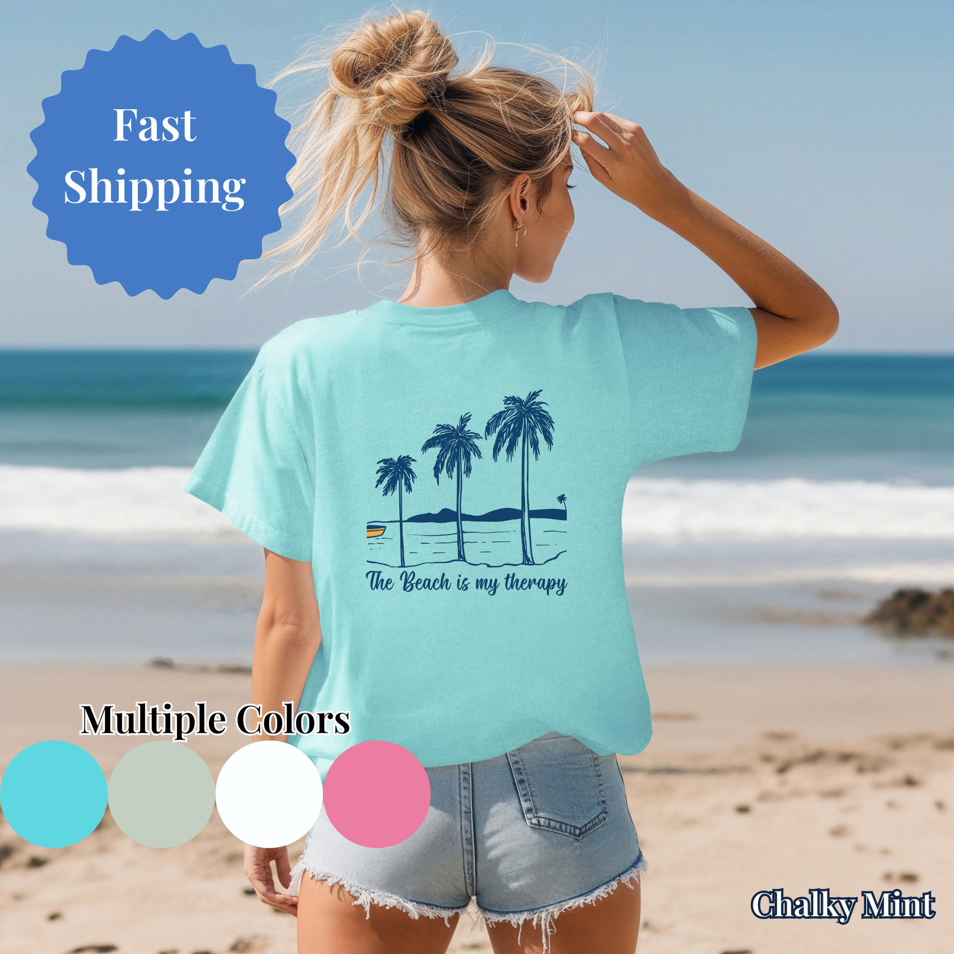 Woman wearing a light blue t-shirt with palm tree design on a beach, with color swatches and text overlay.