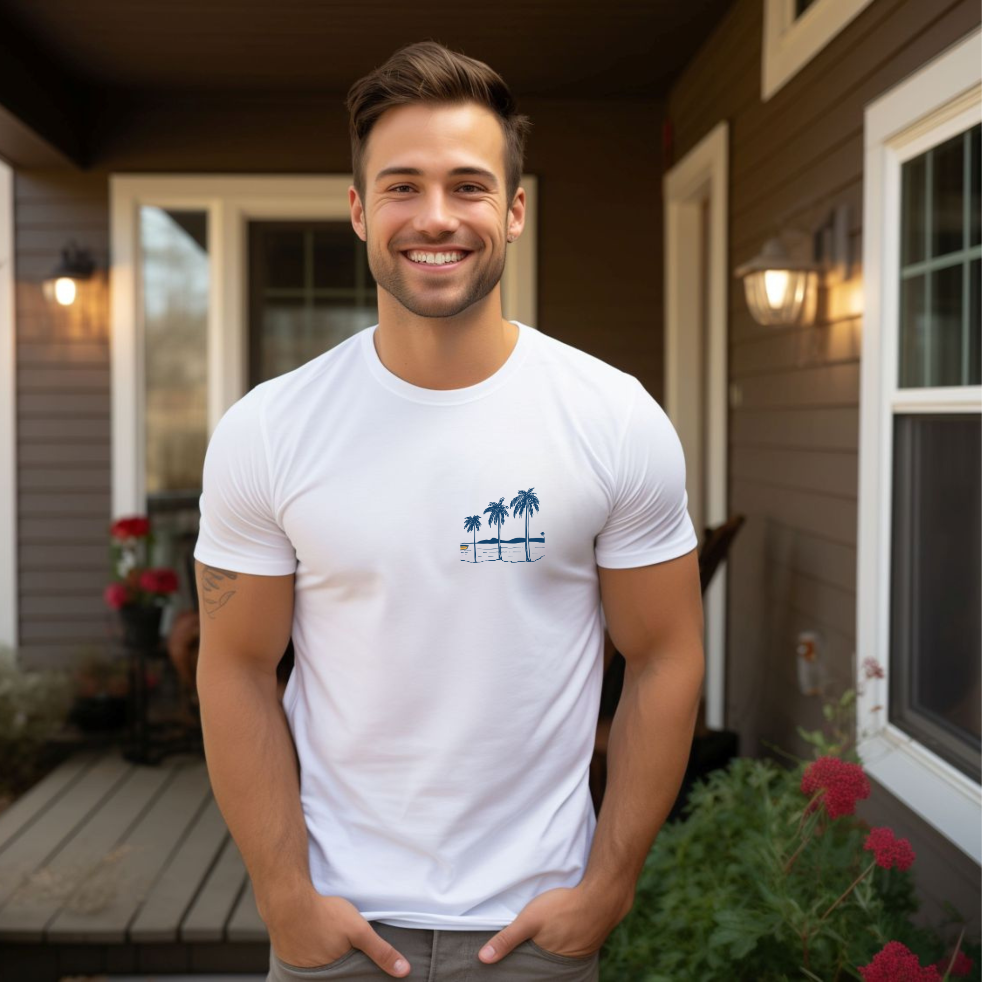Man wearing a white t-shirt with a palm tree design on a porch.