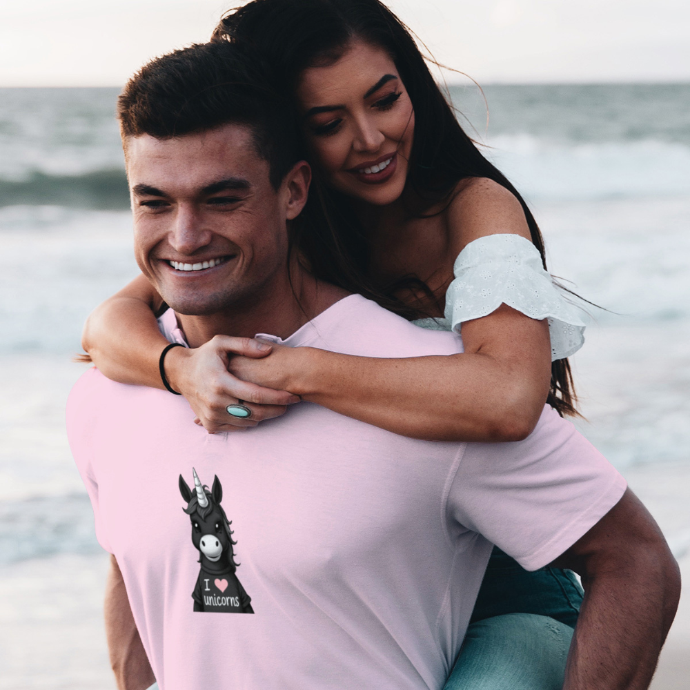 Man and woman embracing with ocean in the background