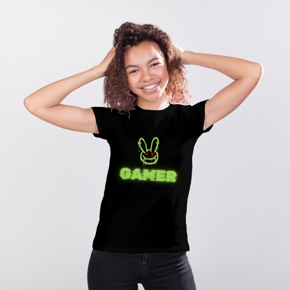 Person wearing a black t-shirt with a green graphic and text on a white background