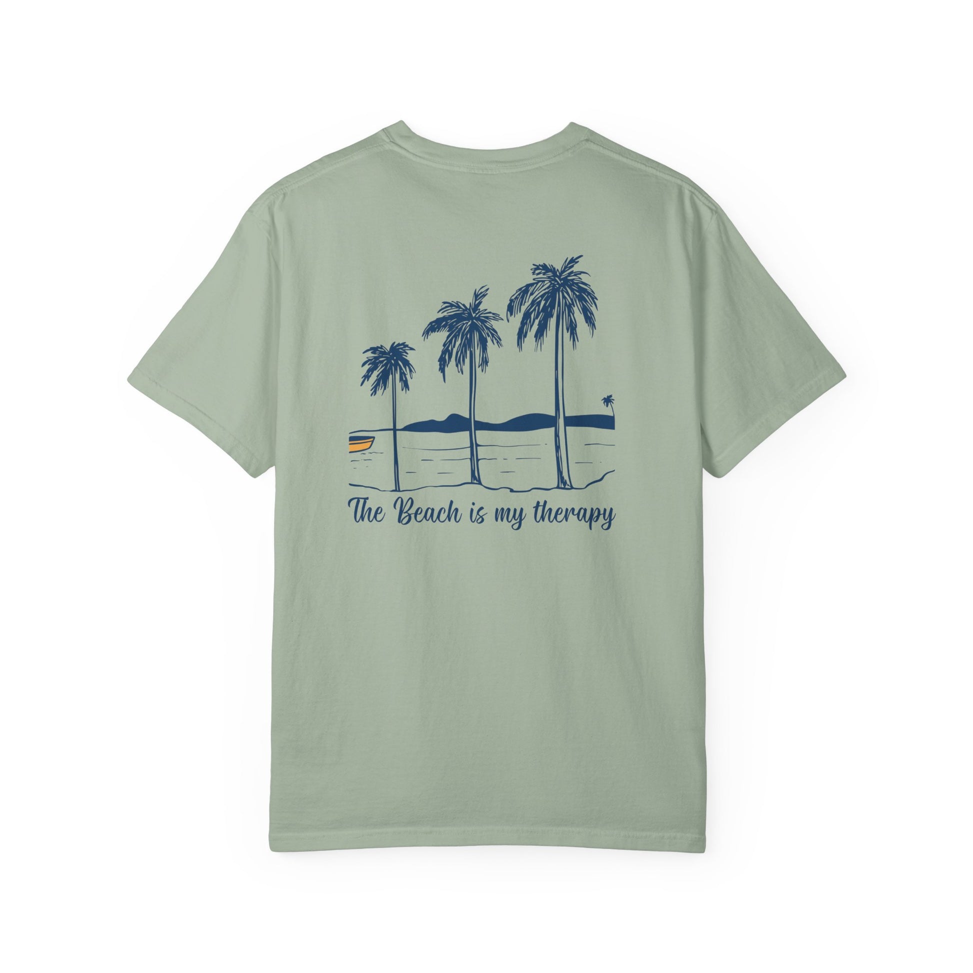 Light green t-shirt with palm tree design and text on a white background