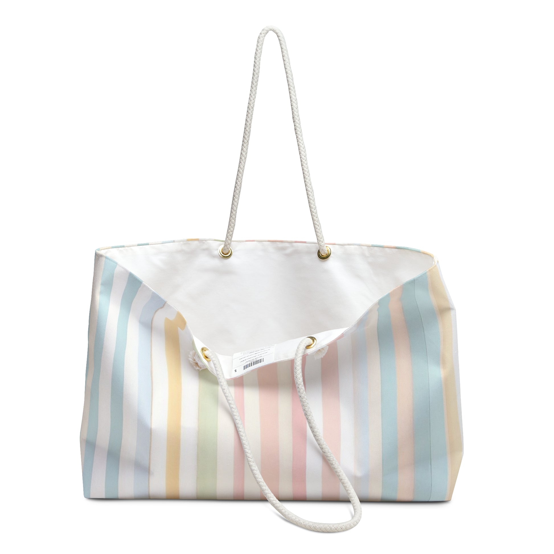 Striped tote bag with a white handle on a white background