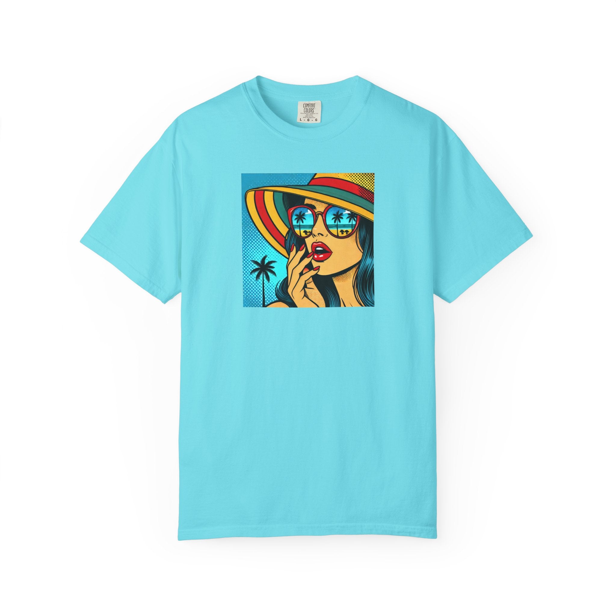 Light blue t-shirt with a colorful graphic of a woman on a white background