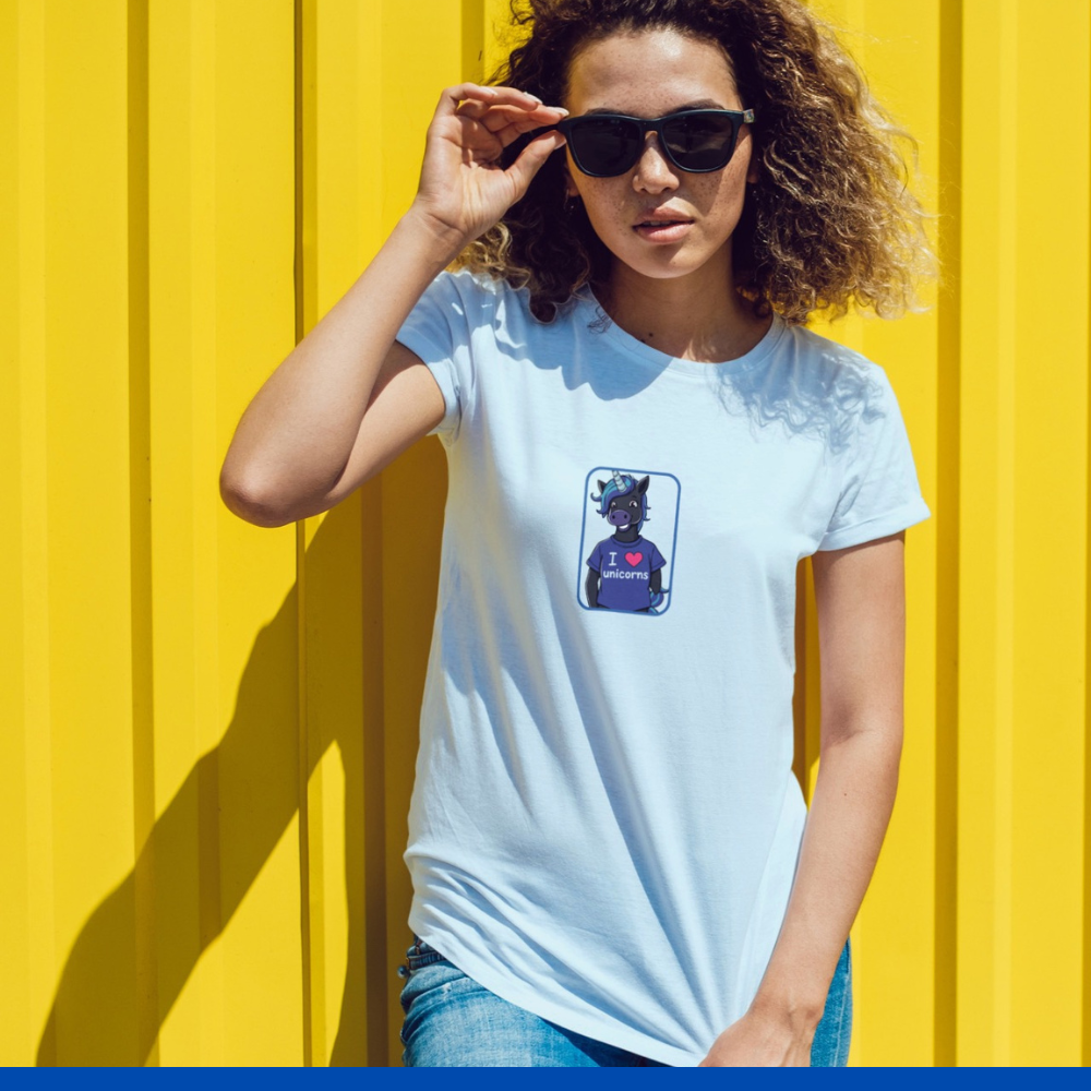 Woman wearing a white t-shirt with a graphic design against a yellow background