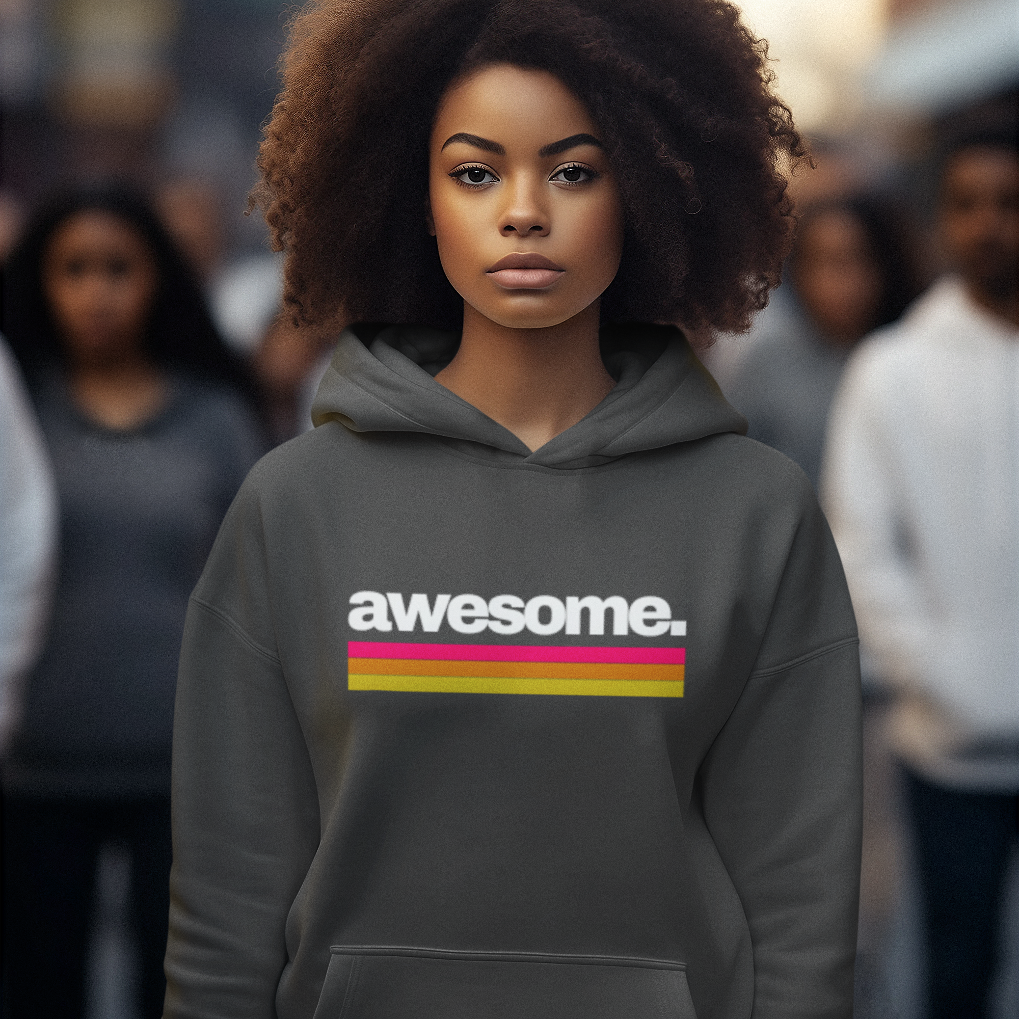 Person wearing a hoodie with 'awesome' text in a crowd