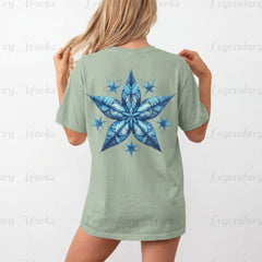 Person wearing a green t-shirt with a blue star design on the back against a white background