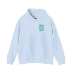 Light blue hoodie with a teal beach with hibiscus and palm tree graphic on a white background