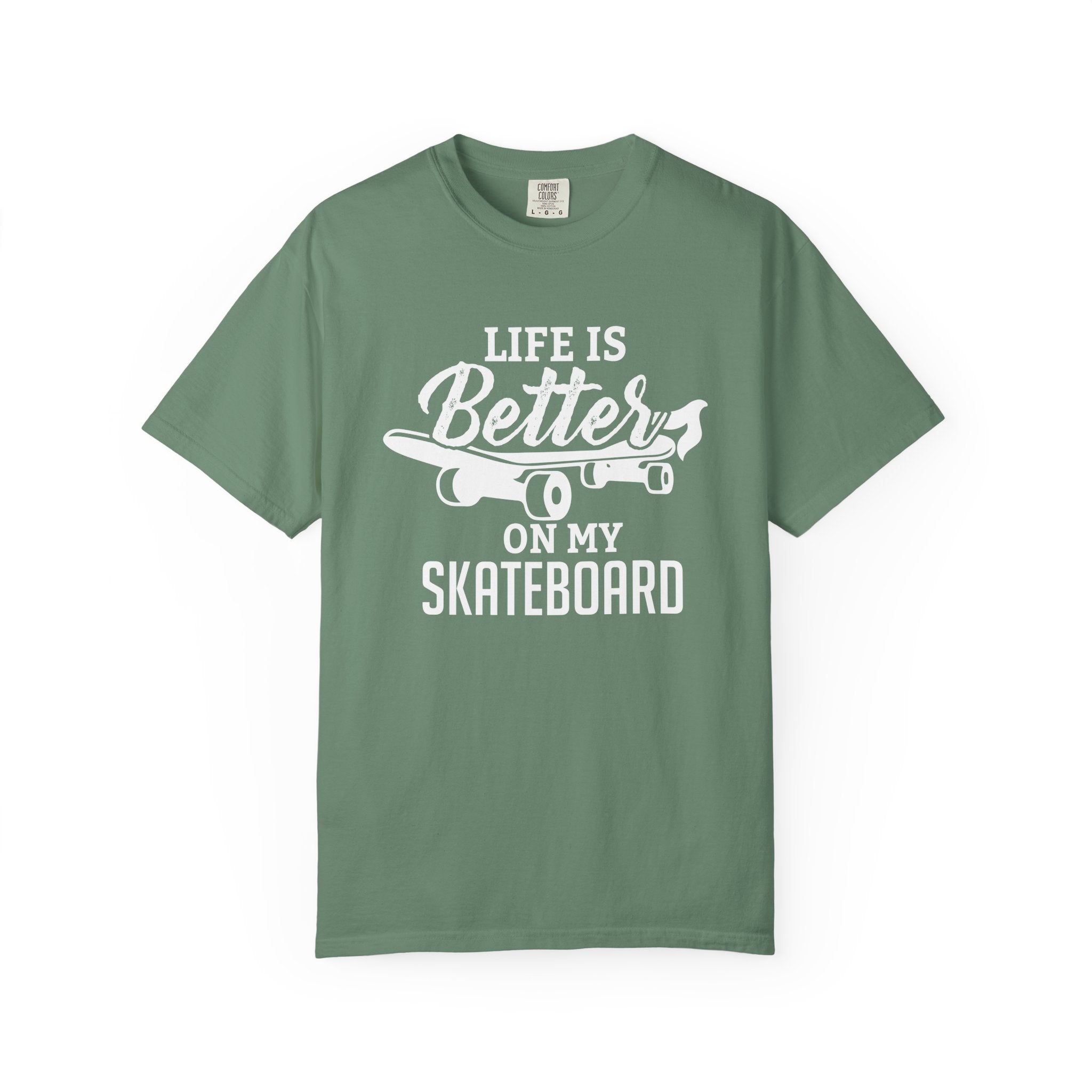 Green t-shirt with 'Life is Better on My Skateboard' text and graphic on a white background