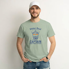 Man wearing a light green t-shirt with a 'Motor Boat Captain' graphic design on a plain background