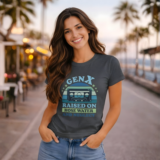 Woman wearing a t-shirt with 'GENX Raised on Hose Water' design on a street with palm trees in the background.