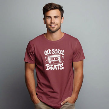 Man wearing a maroon t-shirt with 'Old School Beats' design on a gray background