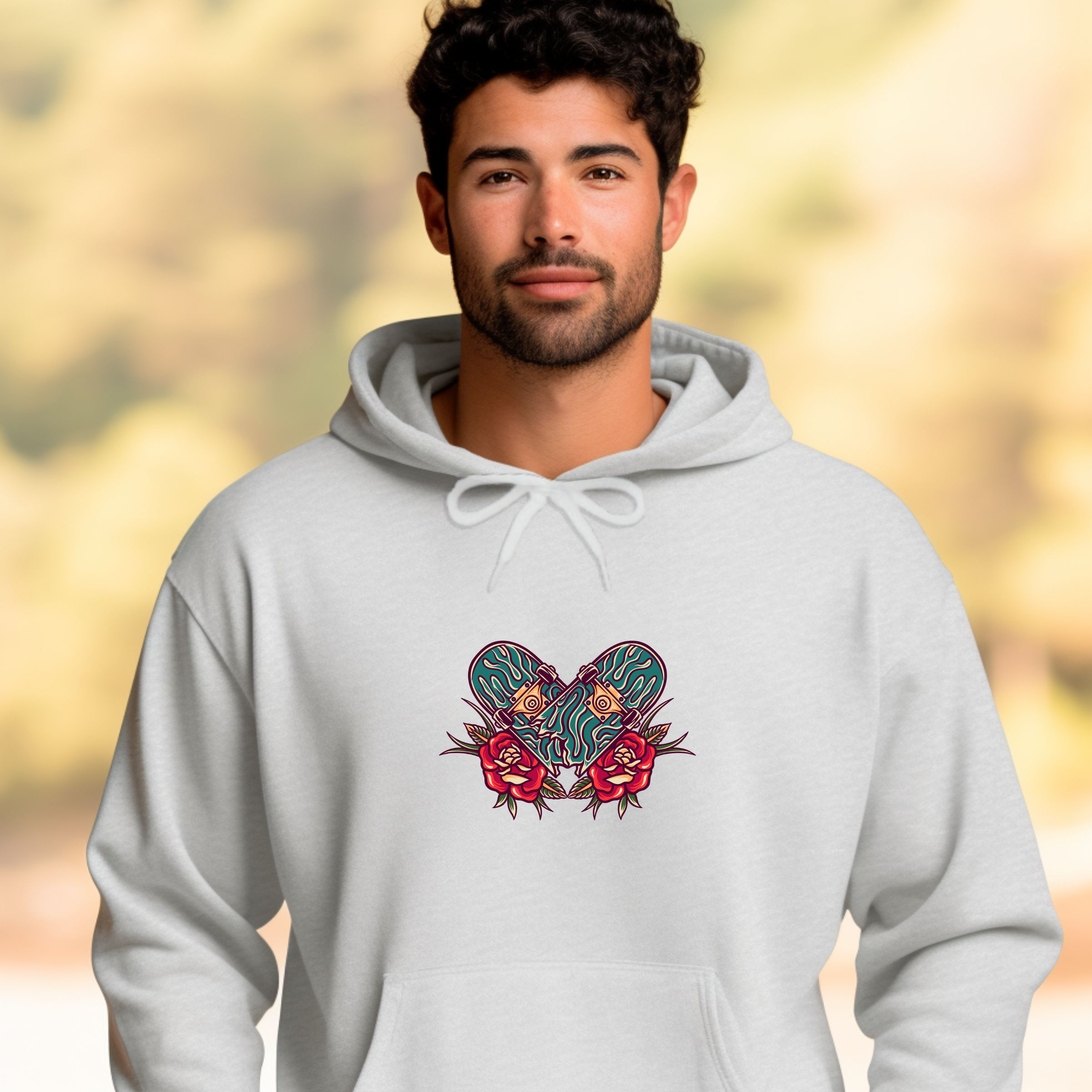 Man wearing a white hoodie with a colorful skateboard butterfly design on a blurred background